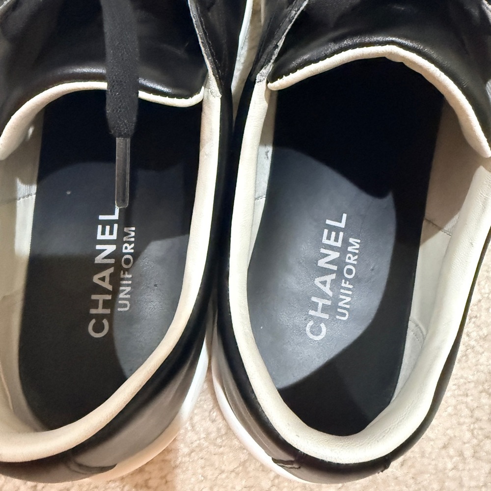 CHANEL Black Leather Low-Top Sneakers with White Sole Accent - Picture 7 of 14